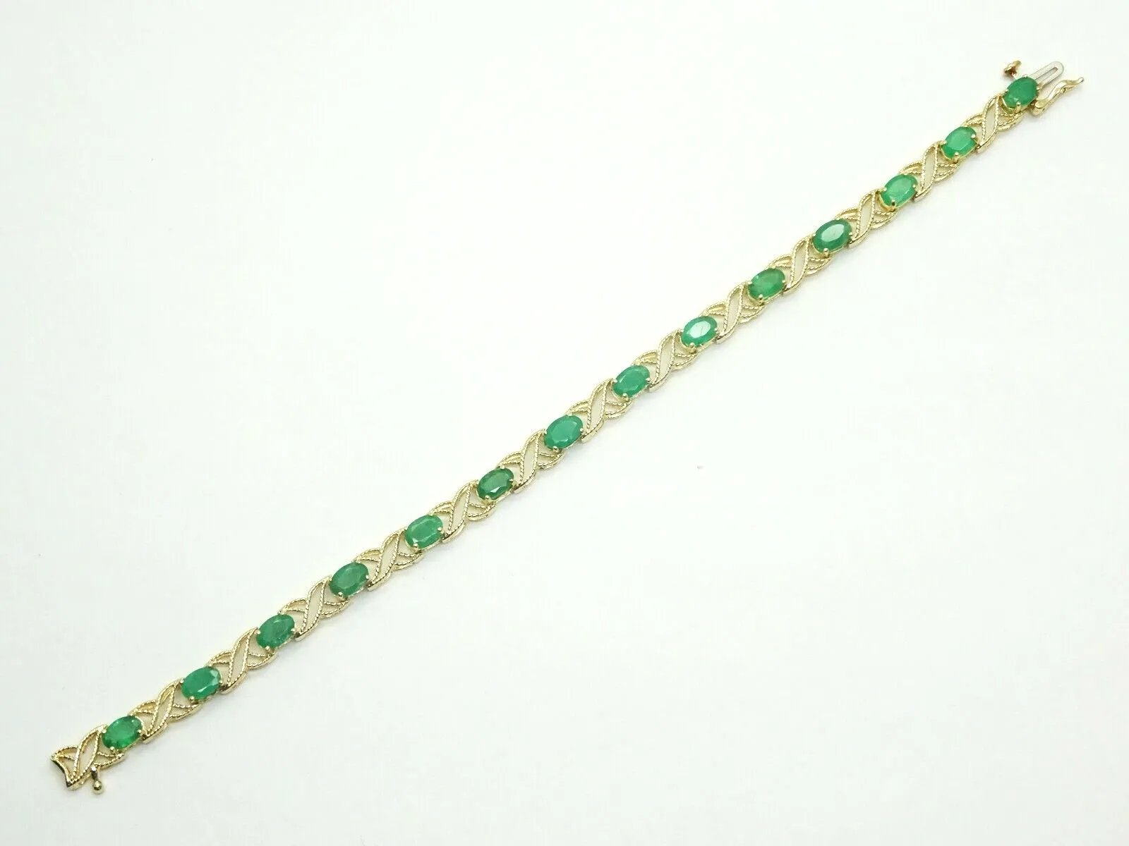 6ct tw Oval Natural Emerald Filigree Tennis Bracelet 14k Gold 7"