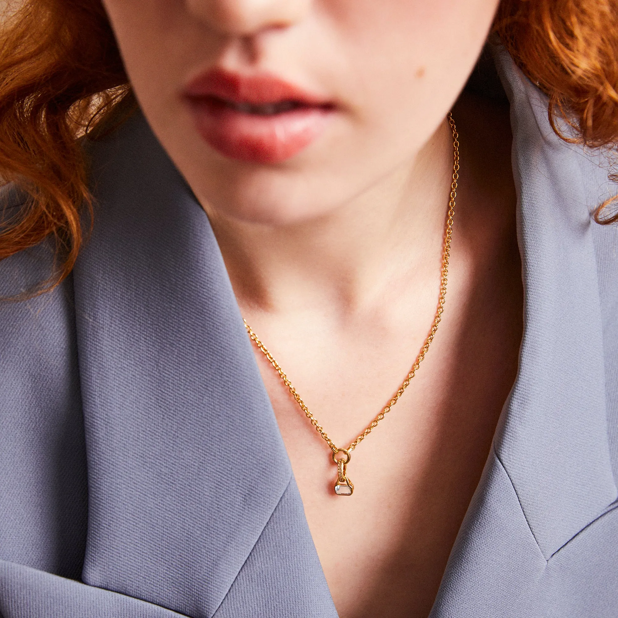 April: White Topaz Charm