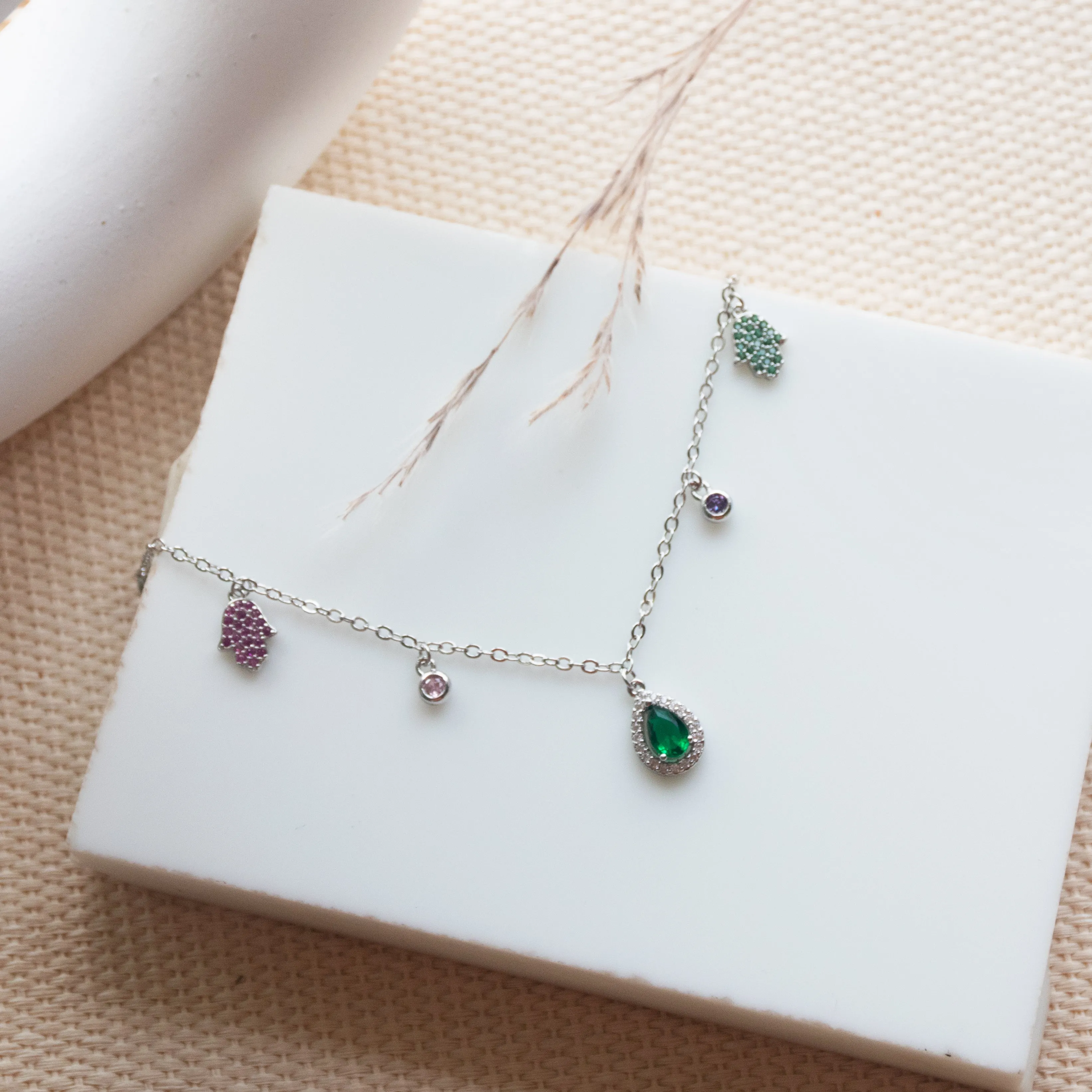 Cosmic Gleam Emerald Charm Choker