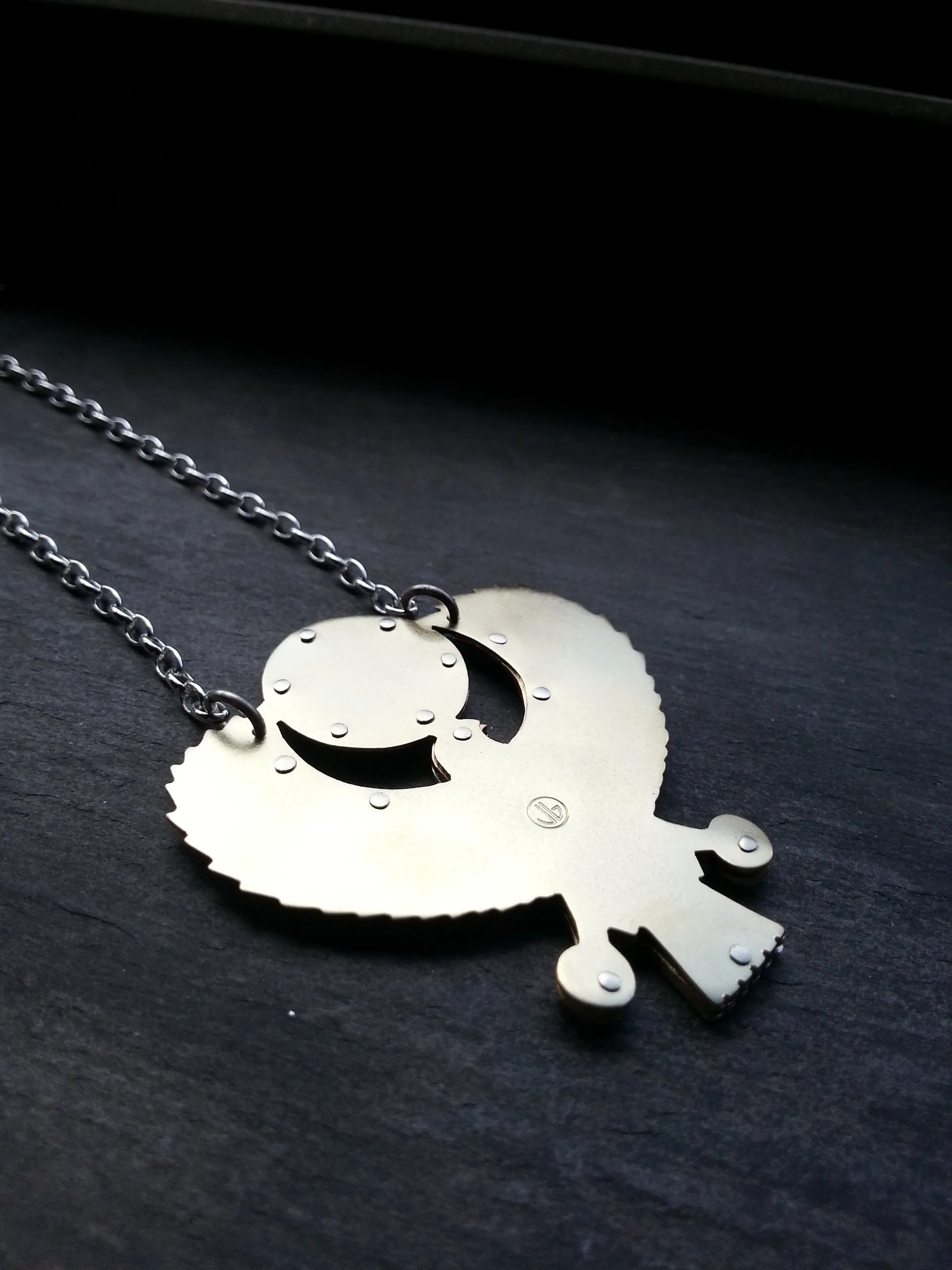 Handcut Egyptian Horus Pendant - holding seed of life red garnet