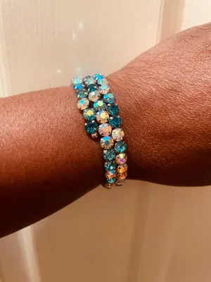 Iridescent Incantation - Blue and Iridescent Coil Bracelet - Paparazzi Accessories