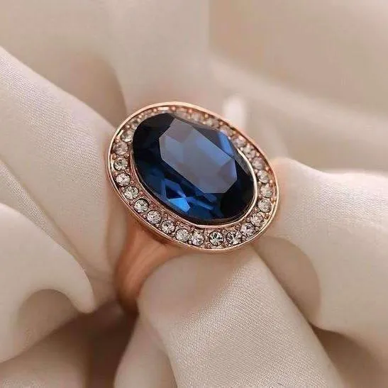 Rhapsody in Blue Classic Oval Sapphire Blue and Diamond Austrian Crystal Halo Cocktail Ring